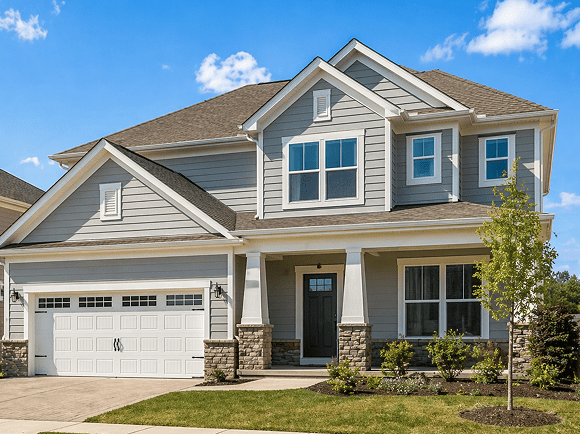 Modern Family Home Beautiful suburban house with fresh exterior paint and updated windows.