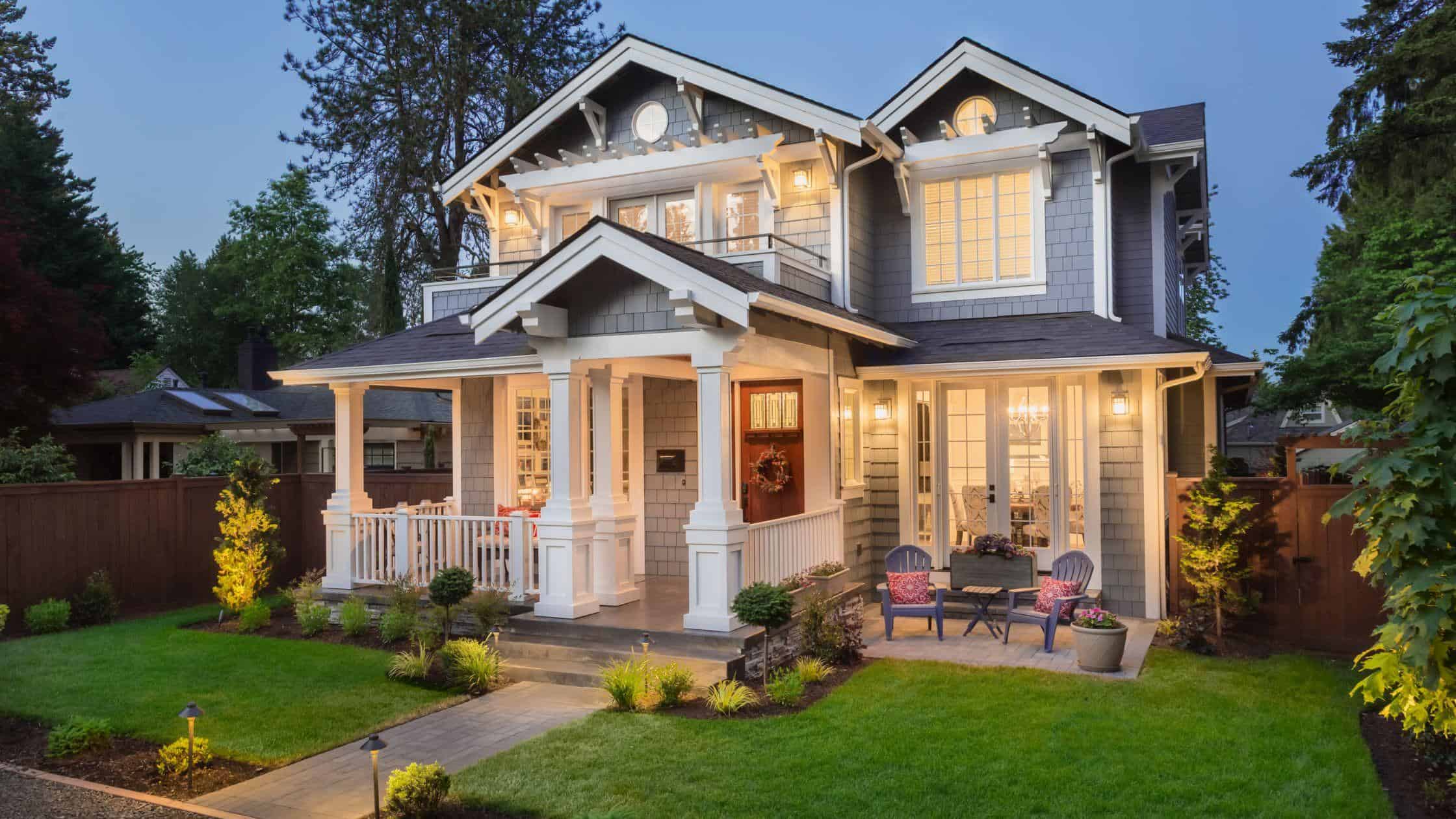 Beautifully renovated modern house with stylish exterior and inviting porch. Expert home renovation.