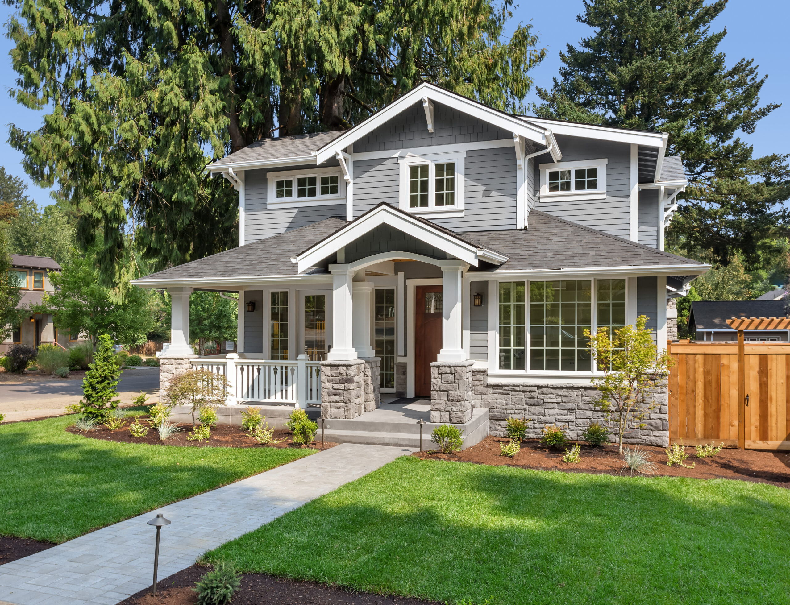 Beautiful Modern Home Elegant modern house with landscaped yard and large windows, perfect for family living.