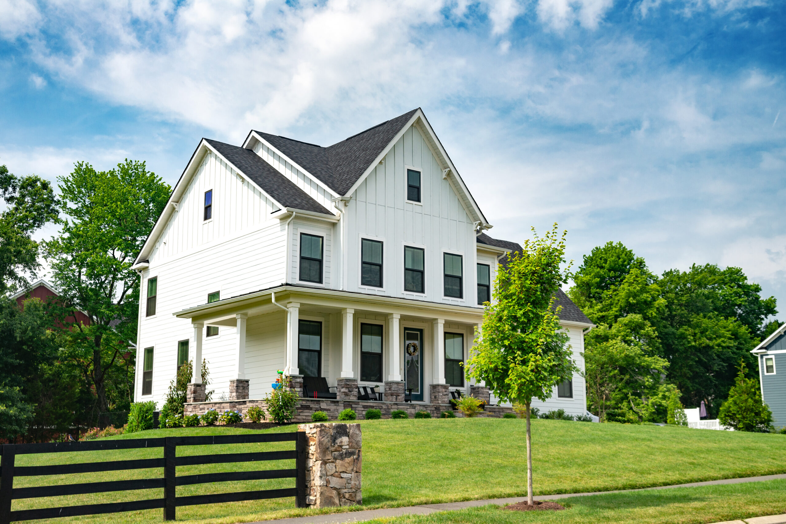 Images of modern house exteriors with various siding styles and roof designs.